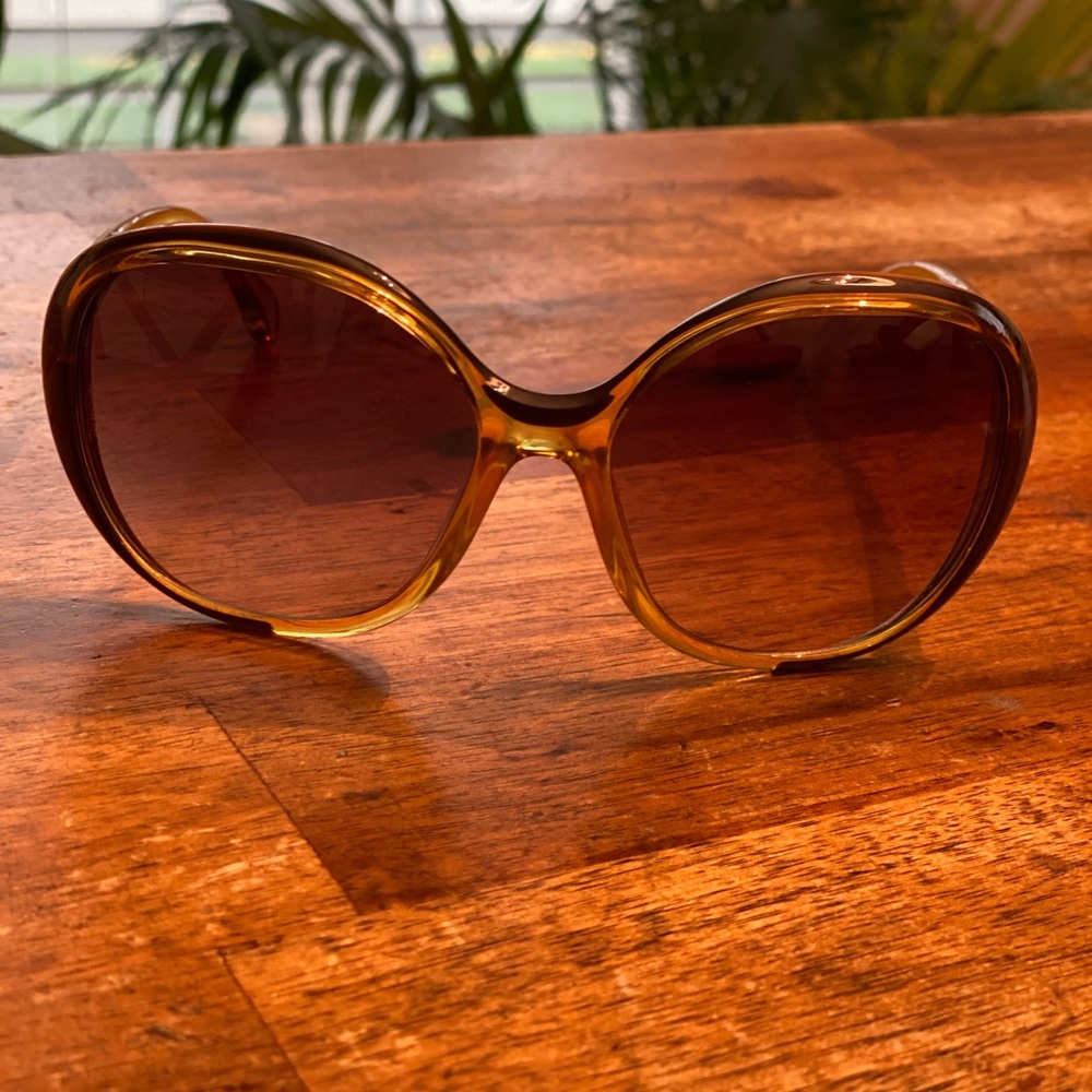 Dolce & Gabbana amber colored sunglasses. Like new. Without case.
